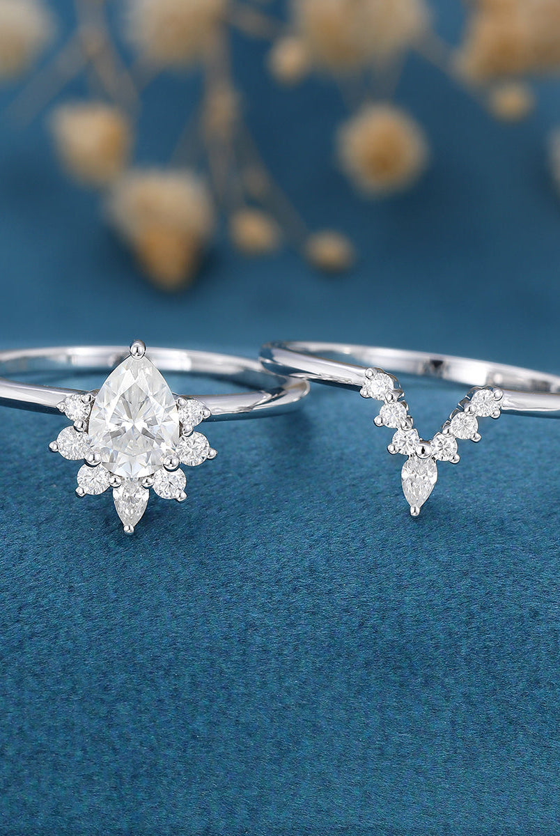 0-69-ct-pear-shaped-moissanite-halo-nature-inspired-bridal-set