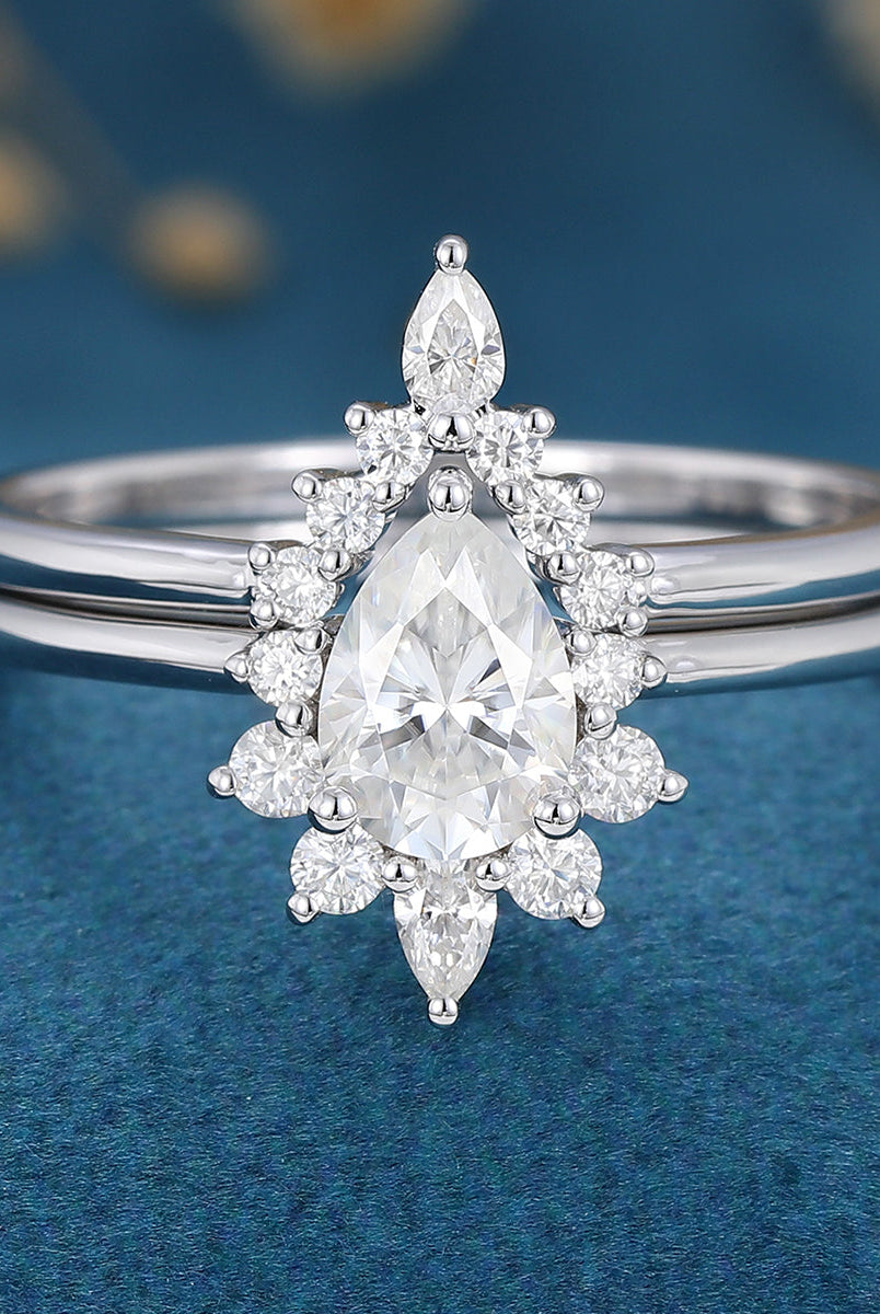pear-shaped-moissanite-halo-nature-inspired-bridal-set