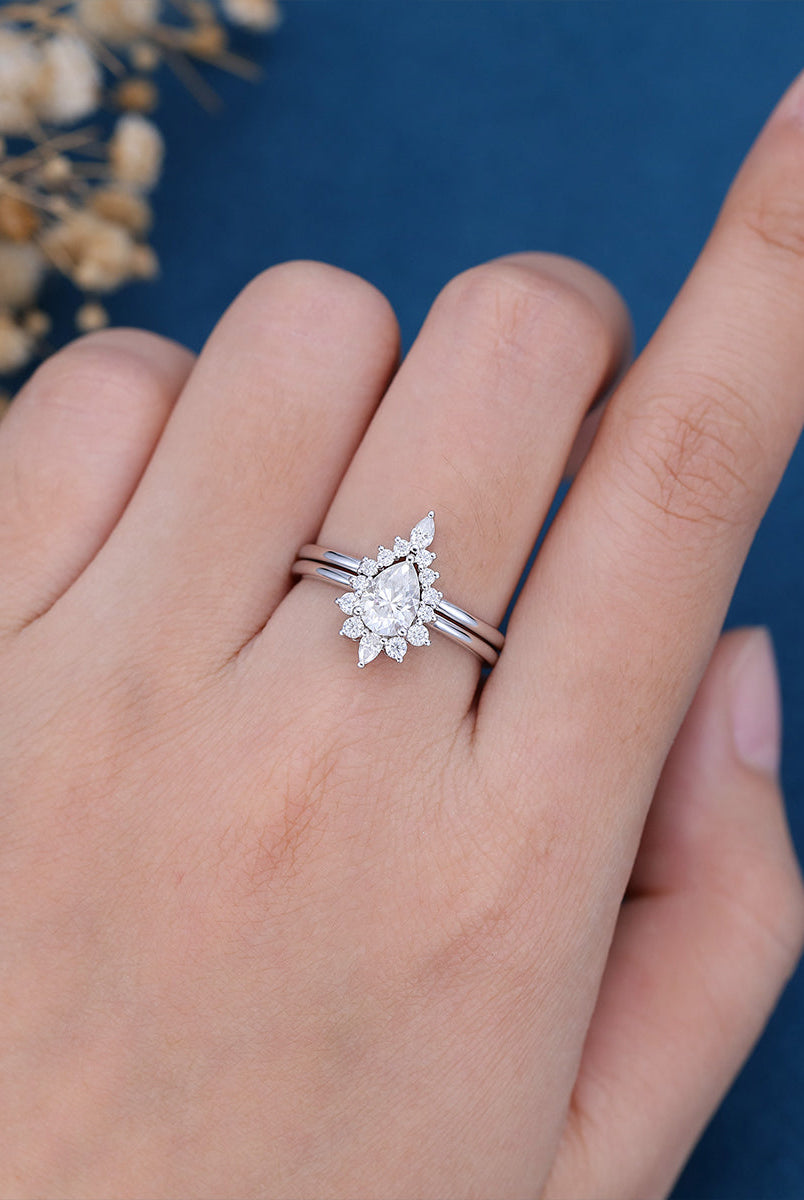 0-69-ct-pear-shaped-moissanite-halo-nature-inspired-bridal-set