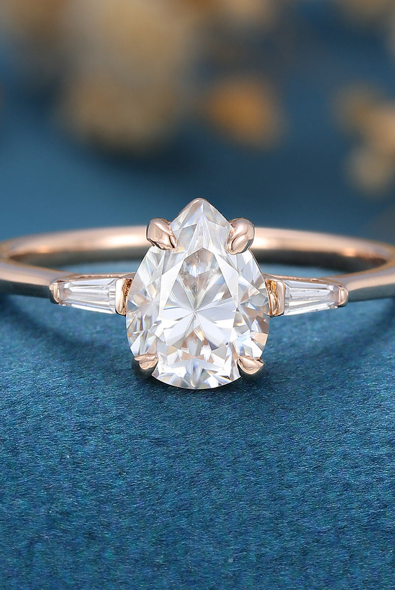 1-0-ct-pear-shaped-moissanite-three-stones-engagement-ring