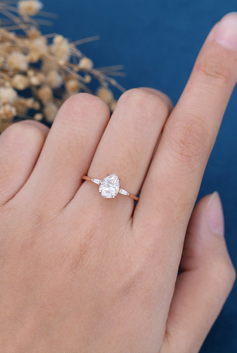 pear-shaped-moissanite-three-stones-engagement-ring