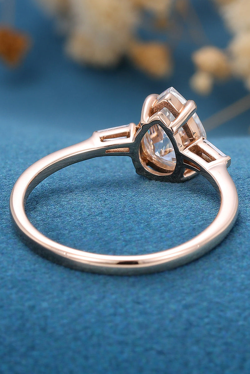 1-0-ct-pear-shaped-moissanite-three-stones-engagement-ring