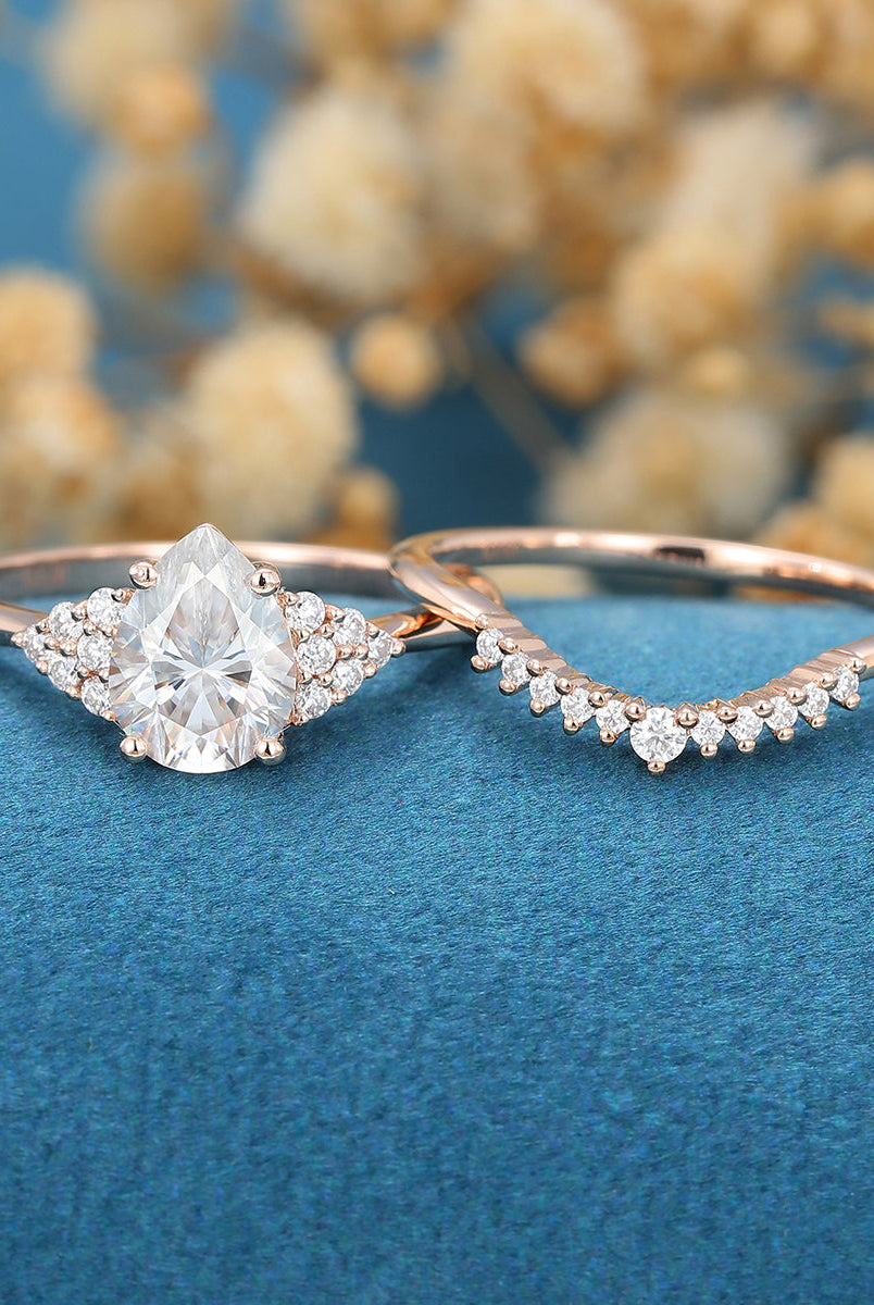 1-0-ct-pear-shaped-moissanite-cluster-bridal-set-8