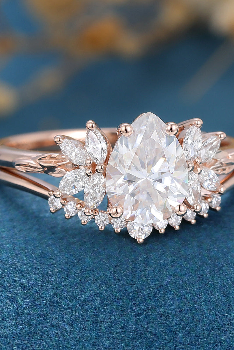 1-0-ct-pear-shaped-moissanite-cluster-bridal-set-1