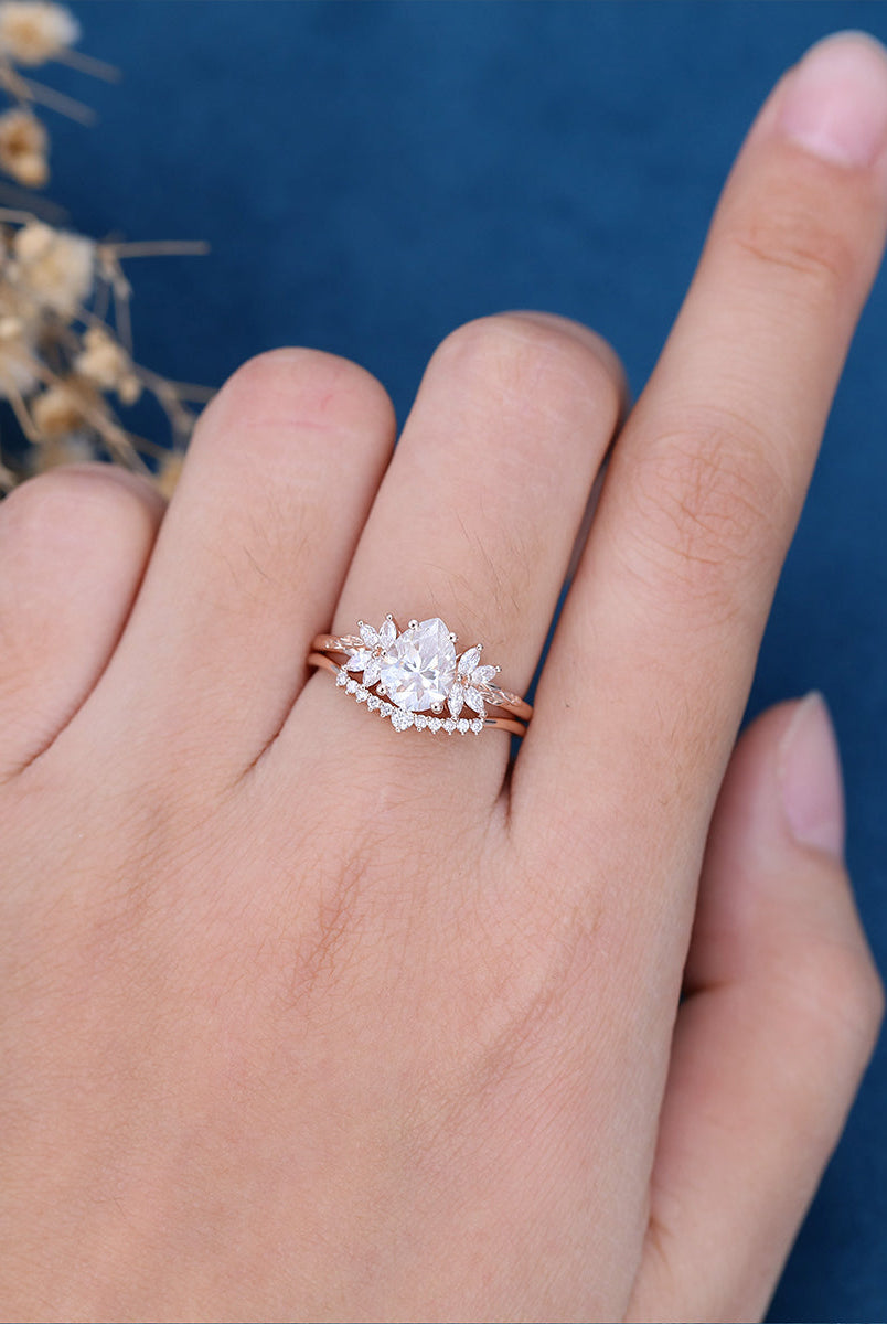 1-0-ct-pear-shaped-moissanite-cluster-bridal-set-1