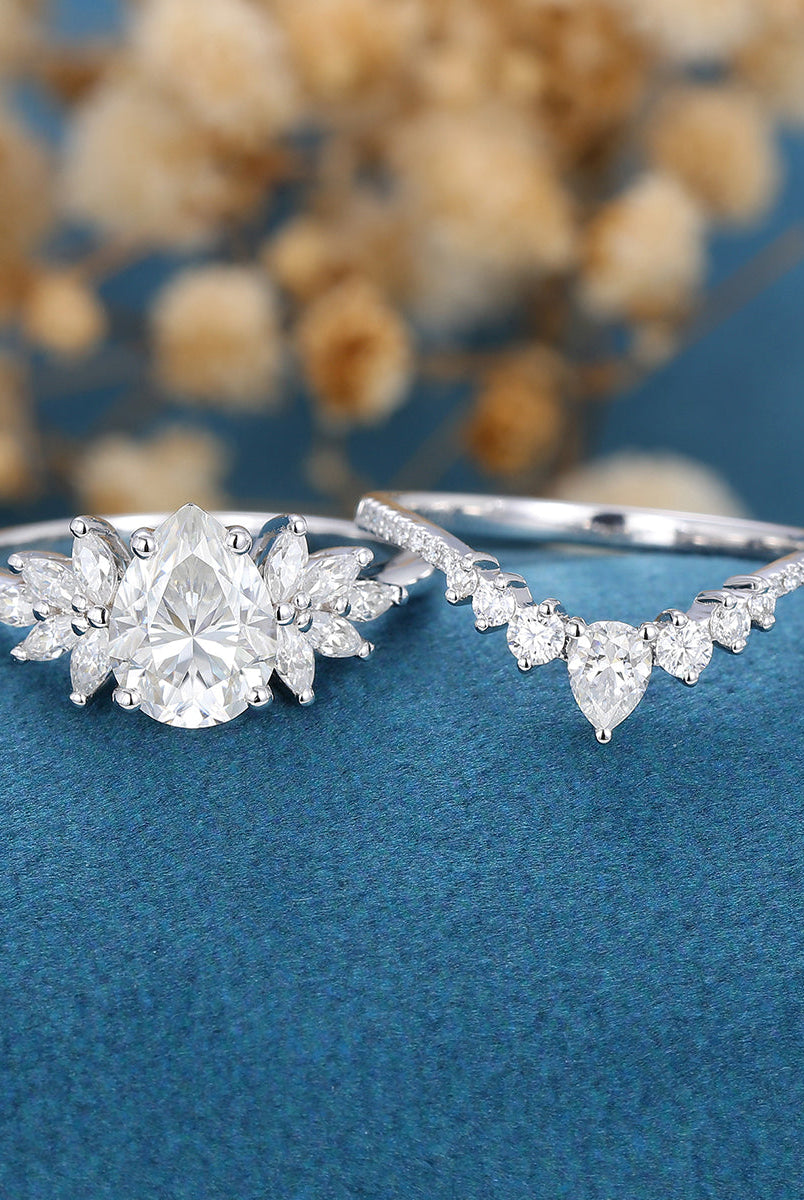 1-0-ct-pear-shaped-moissanite-cluster-bridal-set-9