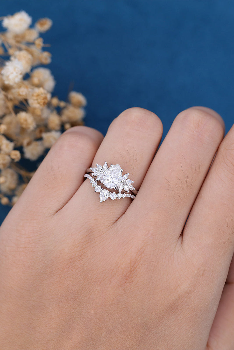 1-0-ct-pear-shaped-moissanite-cluster-bridal-set-9