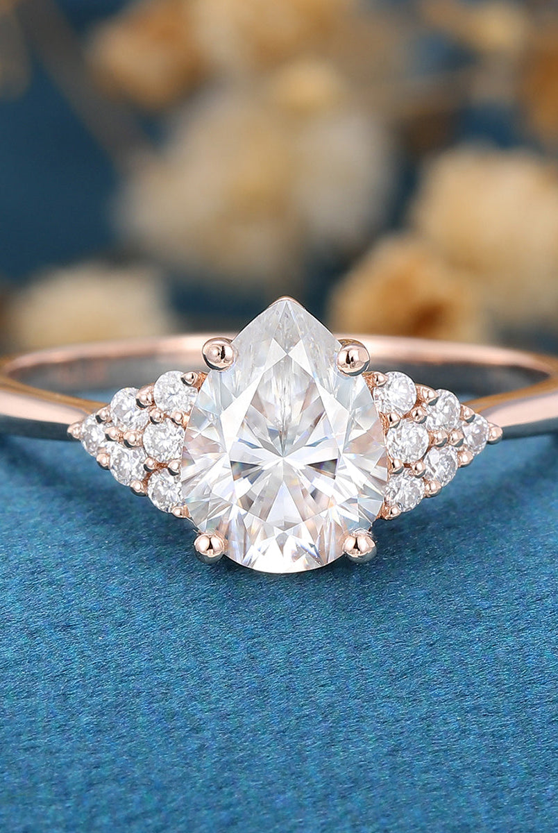 1-0-ct-pear-shaped-moissanite-cluster-engagement-ring-16