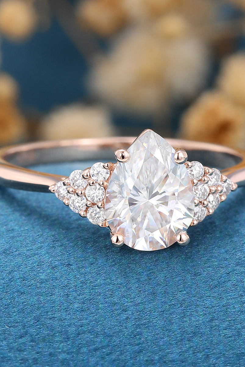 1-0-ct-pear-shaped-moissanite-cluster-engagement-ring-18