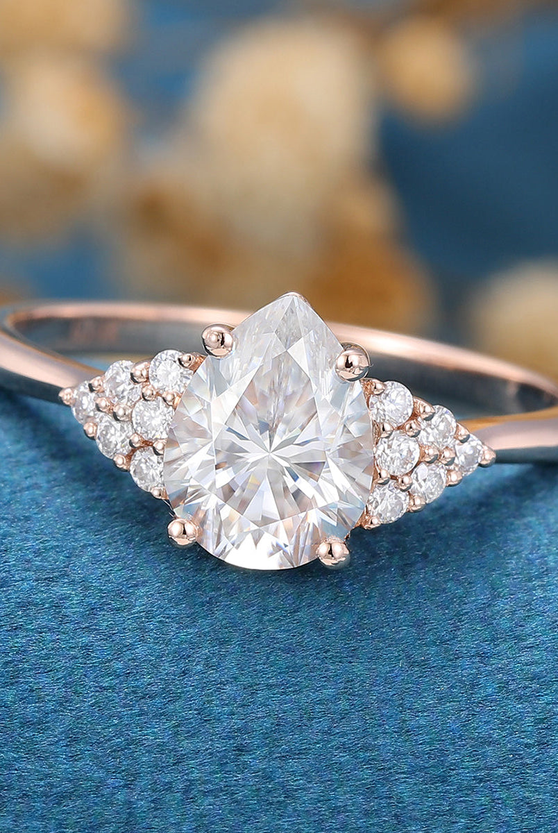 pear-shaped-moissanite-cluster-engagement-ring-17