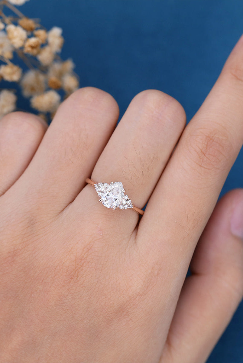 pear-shaped-moissanite-cluster-engagement-ring-17