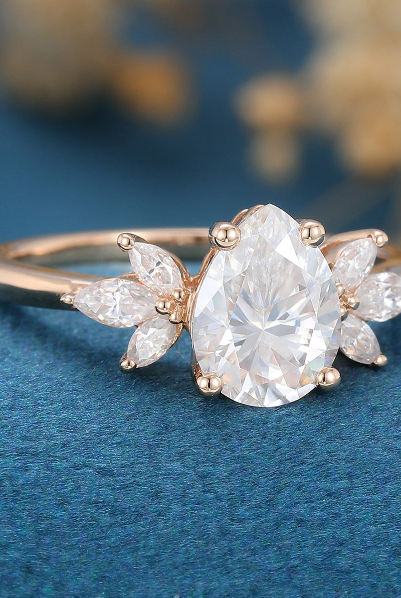 1-0-ct-pear-shaped-moissanite-cluster-engagement-ring-16
