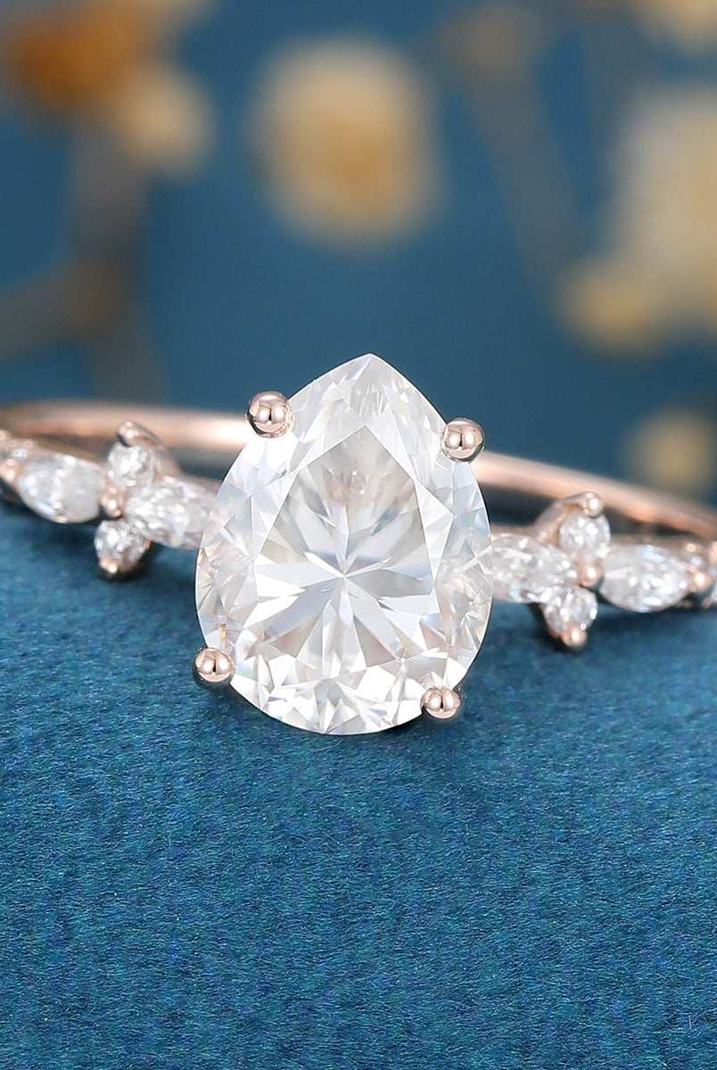 pear-shaped-moissanite-solitaire-pave-engagement-ring