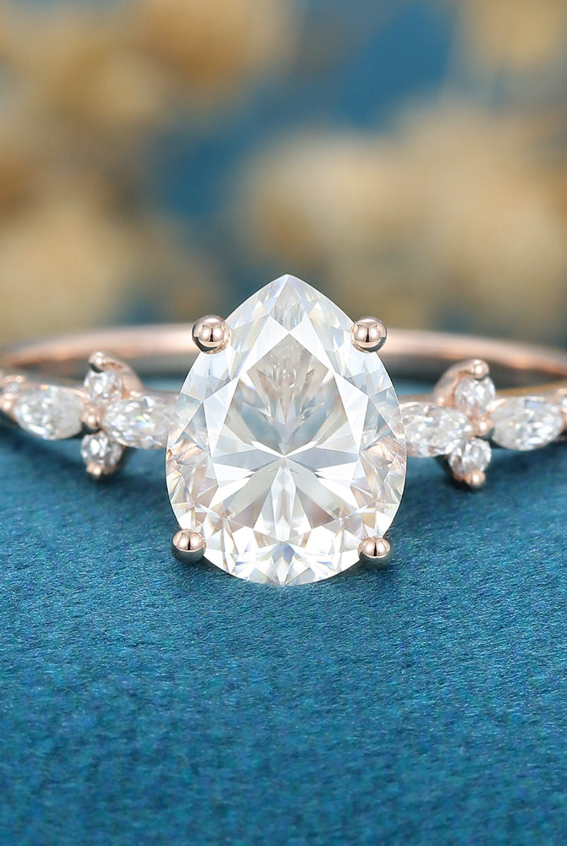 1-0-ct-pear-shaped-moissanite-solitaire-pave-engagement-ring