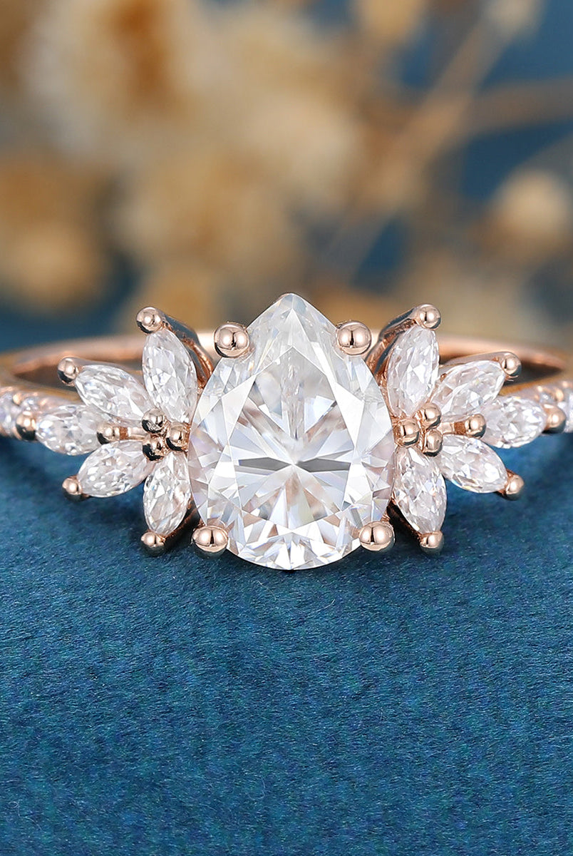 1-0-ct-pear-shaped-moissanite-cluster-engagement-ring-11