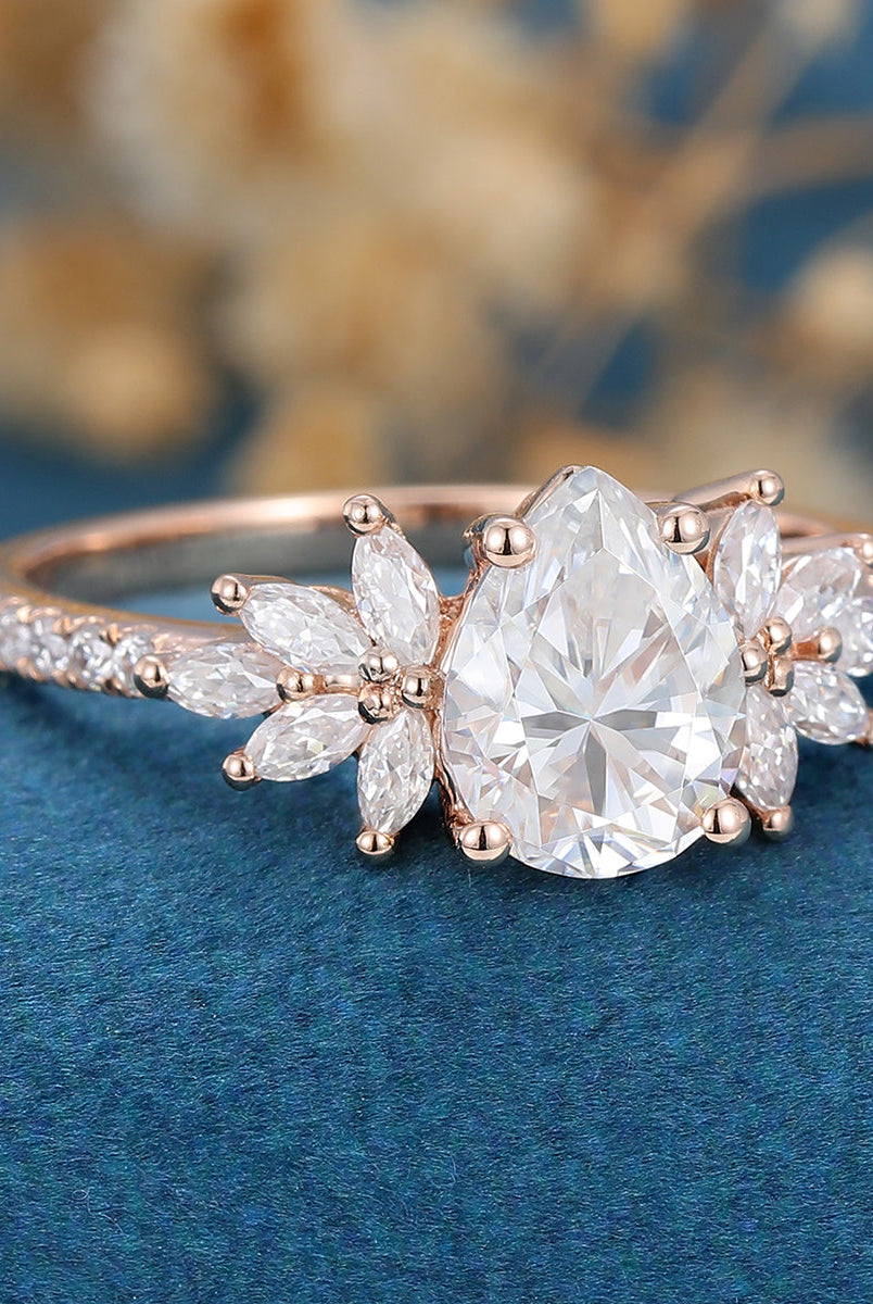 1-0-ct-pear-shaped-moissanite-cluster-engagement-ring-13