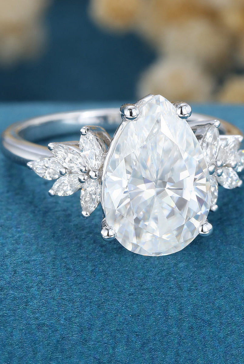 3-09-ct-pear-shaped-moissanite-cluster-engagement-ring