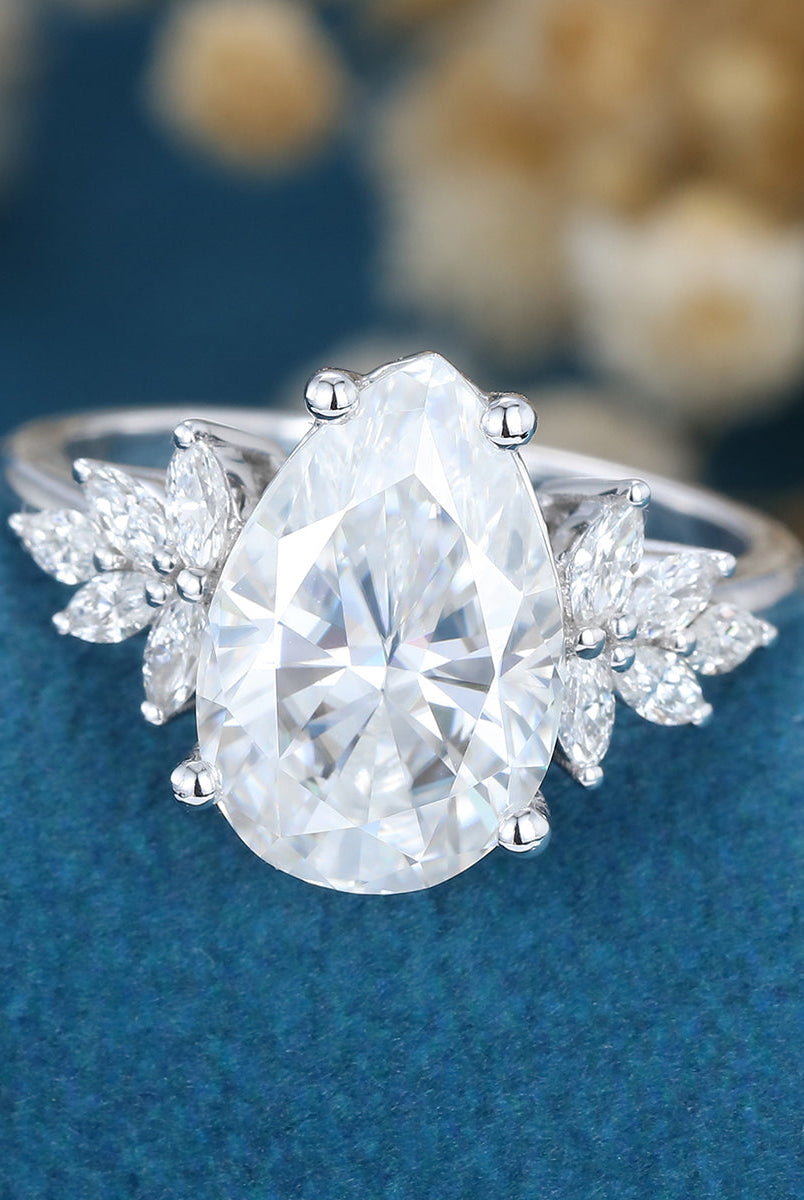 pear-shaped-moissanite-cluster-engagement-ring