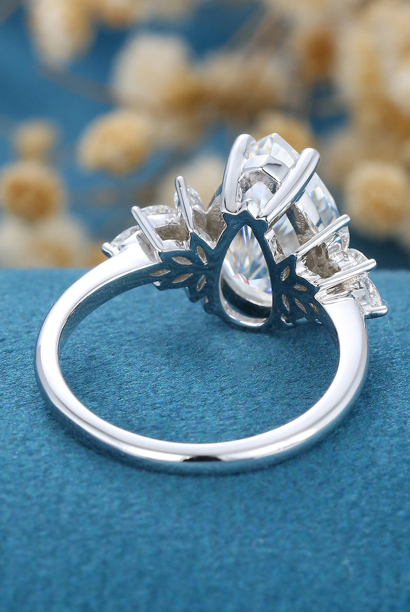 3-09-ct-pear-shaped-moissanite-cluster-engagement-ring