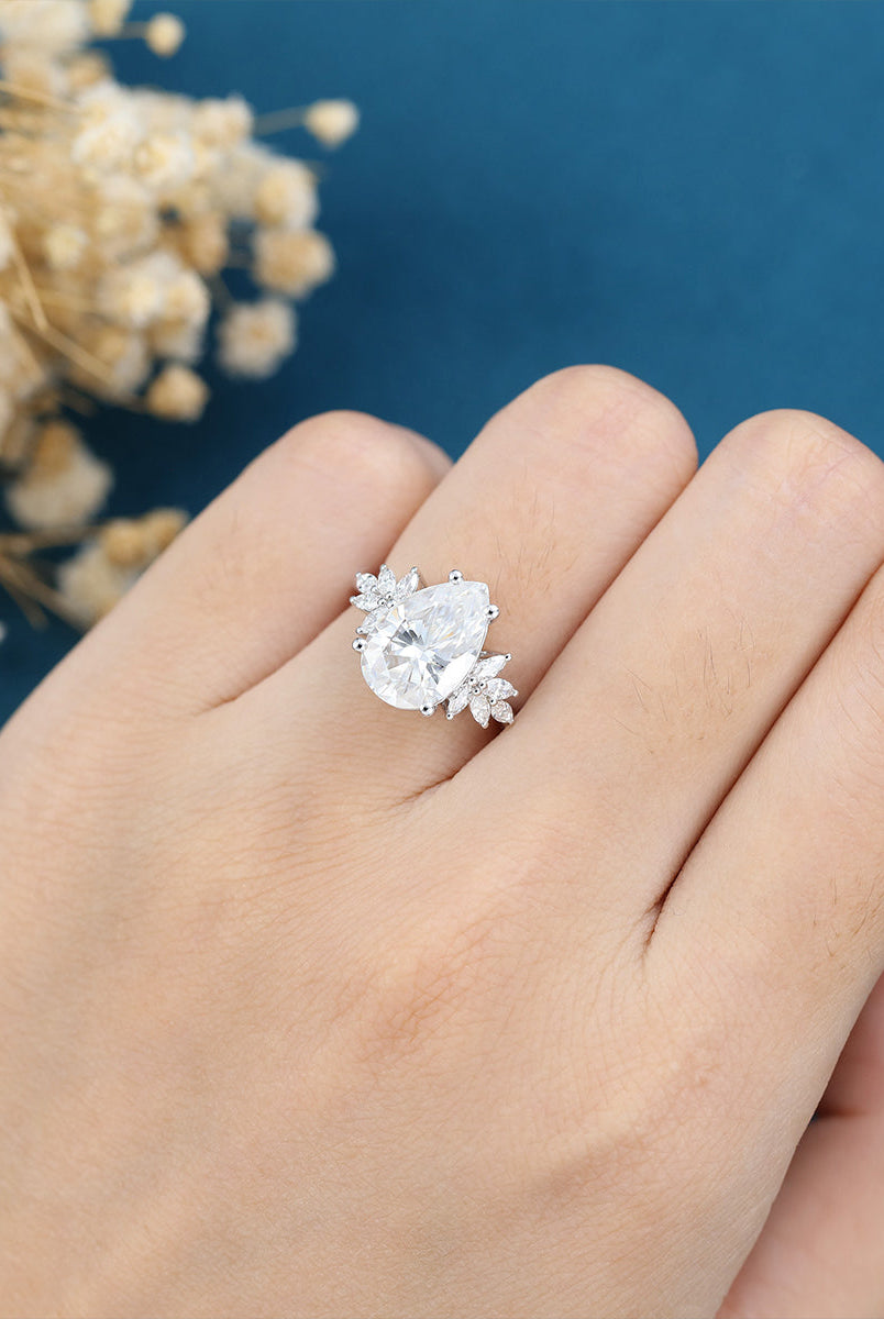 pear-shaped-moissanite-cluster-engagement-ring