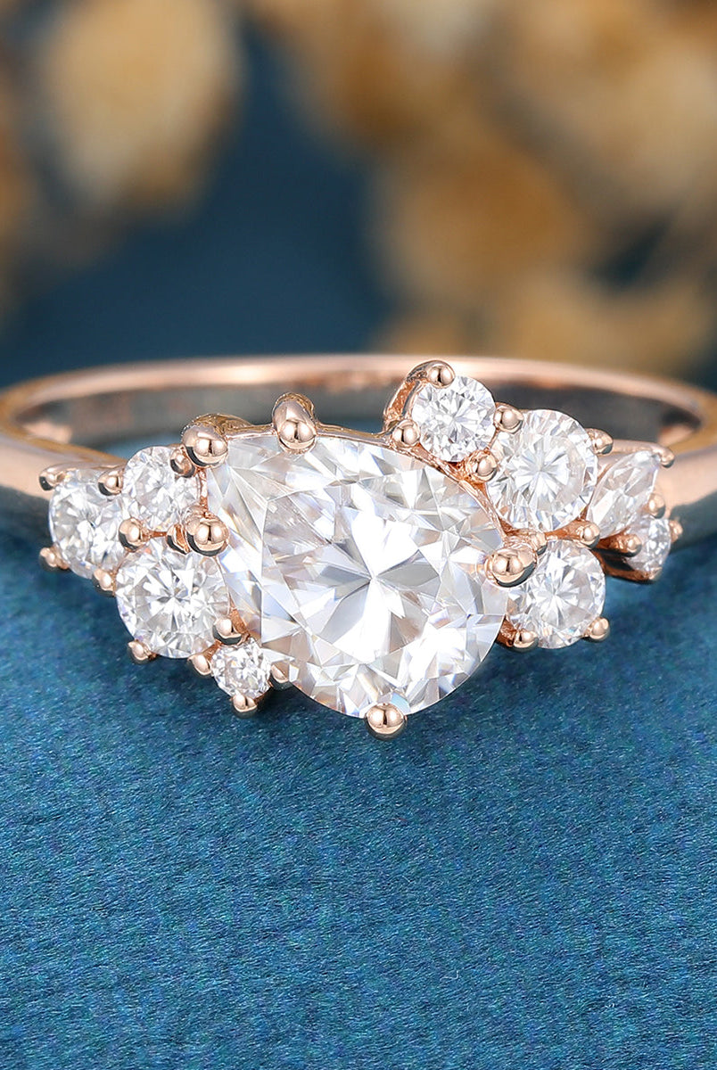 1-0-ct-pear-shaped-moissanite-cluster-engagement-ring-15