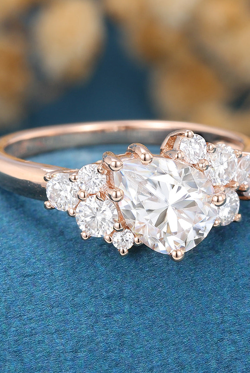 1-0-ct-pear-shaped-moissanite-cluster-engagement-ring-17