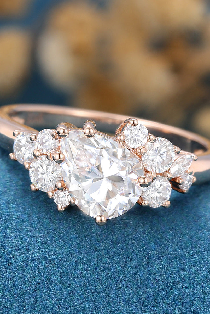 pear-shaped-moissanite-cluster-engagement-ring-16