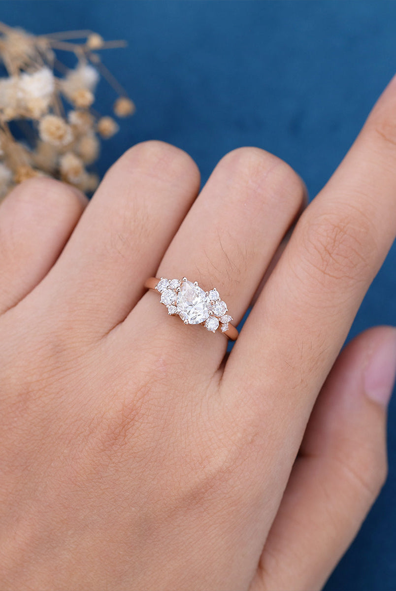 pear-shaped-moissanite-cluster-engagement-ring-16