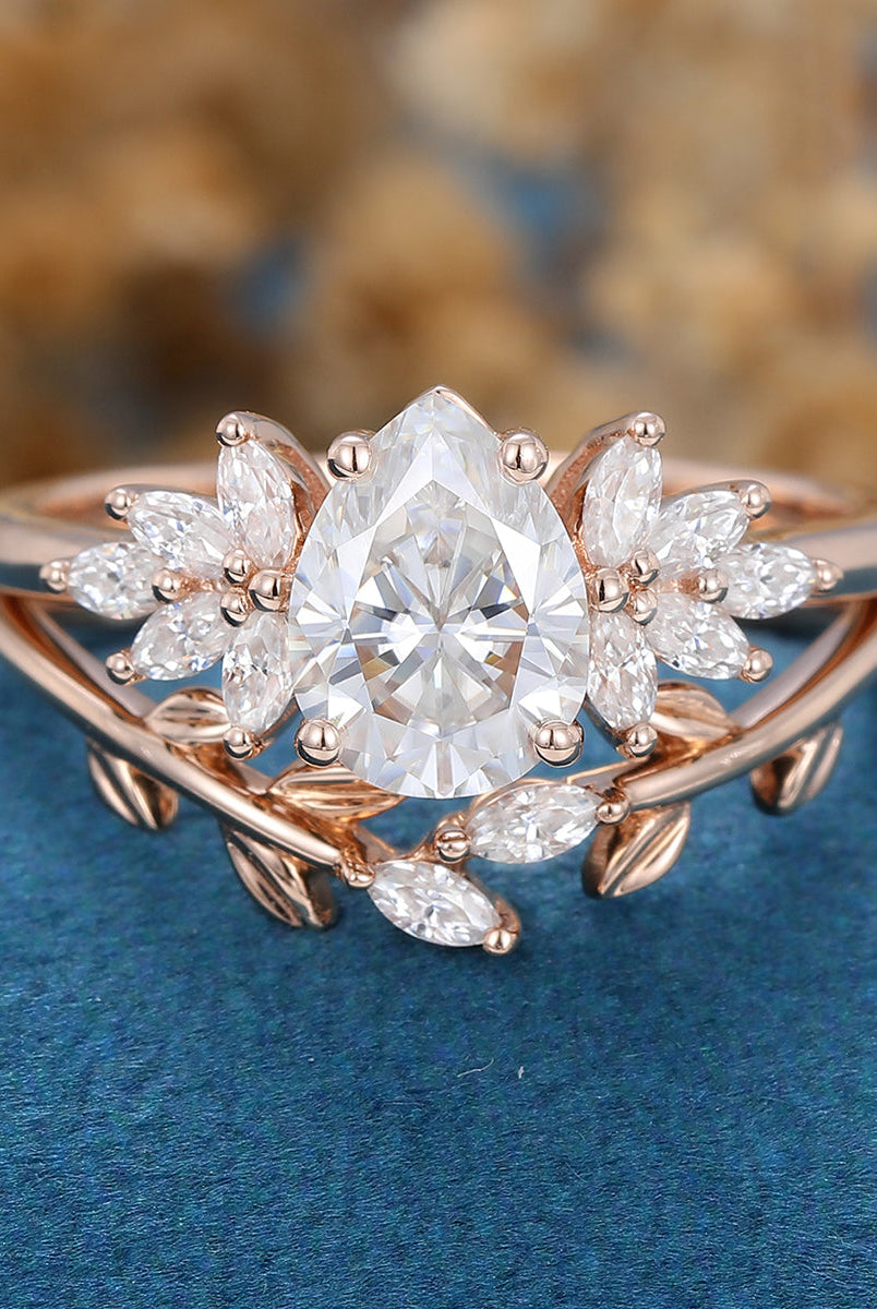 1-0-ct-pear-shaped-moissanite-cluster-bridal-set-7