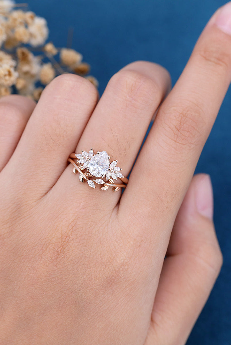 1-0-ct-pear-shaped-moissanite-cluster-bridal-set-7