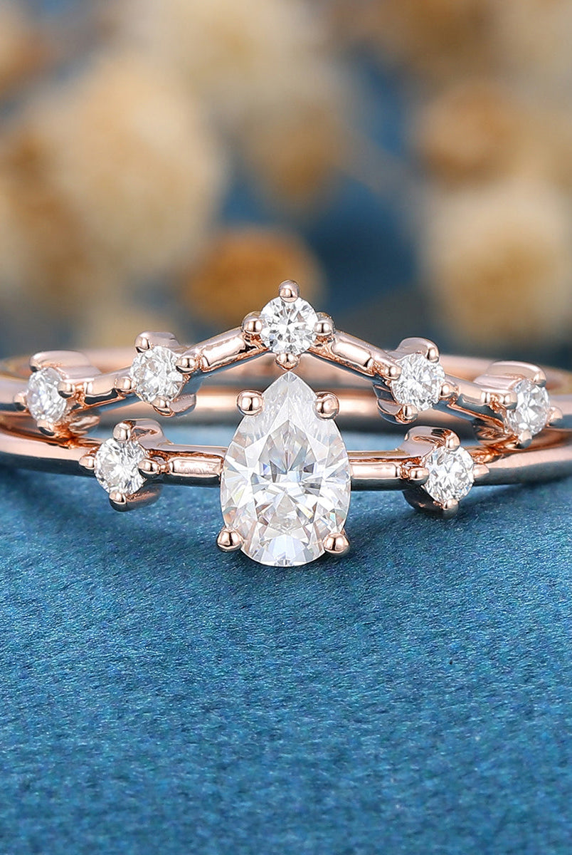 0-39-ct-pear-shaped-moissanite-solitaire-bridal-set