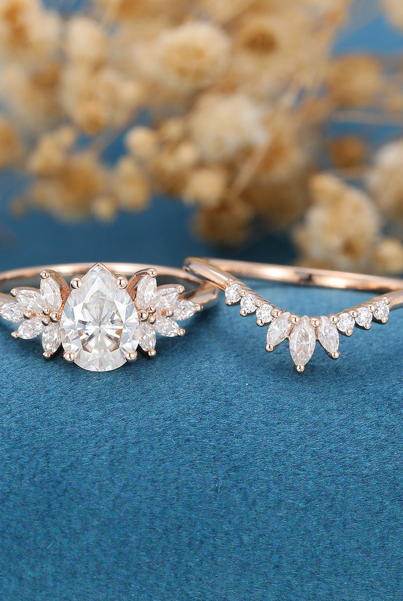 1-0-ct-pear-shaped-moissanite-cluster-bridal-set-2