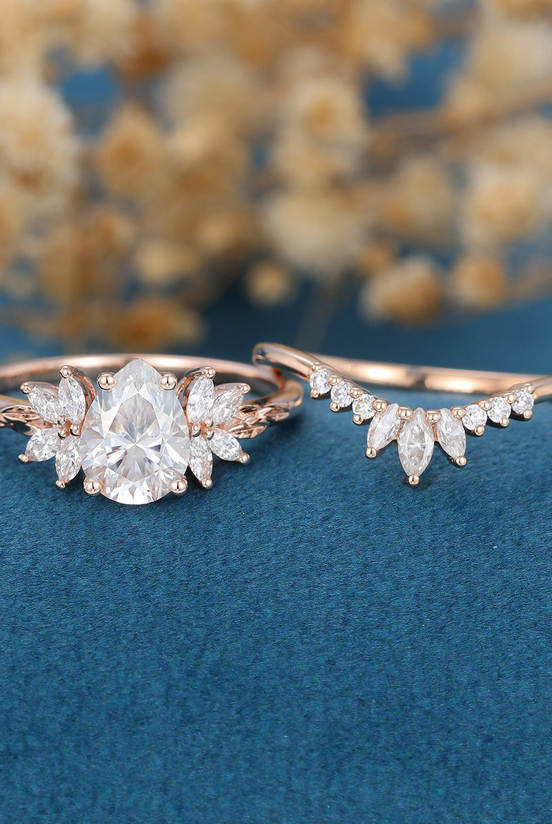 1-0-ct-pear-shaped-moissanite-cluster-bridal-set