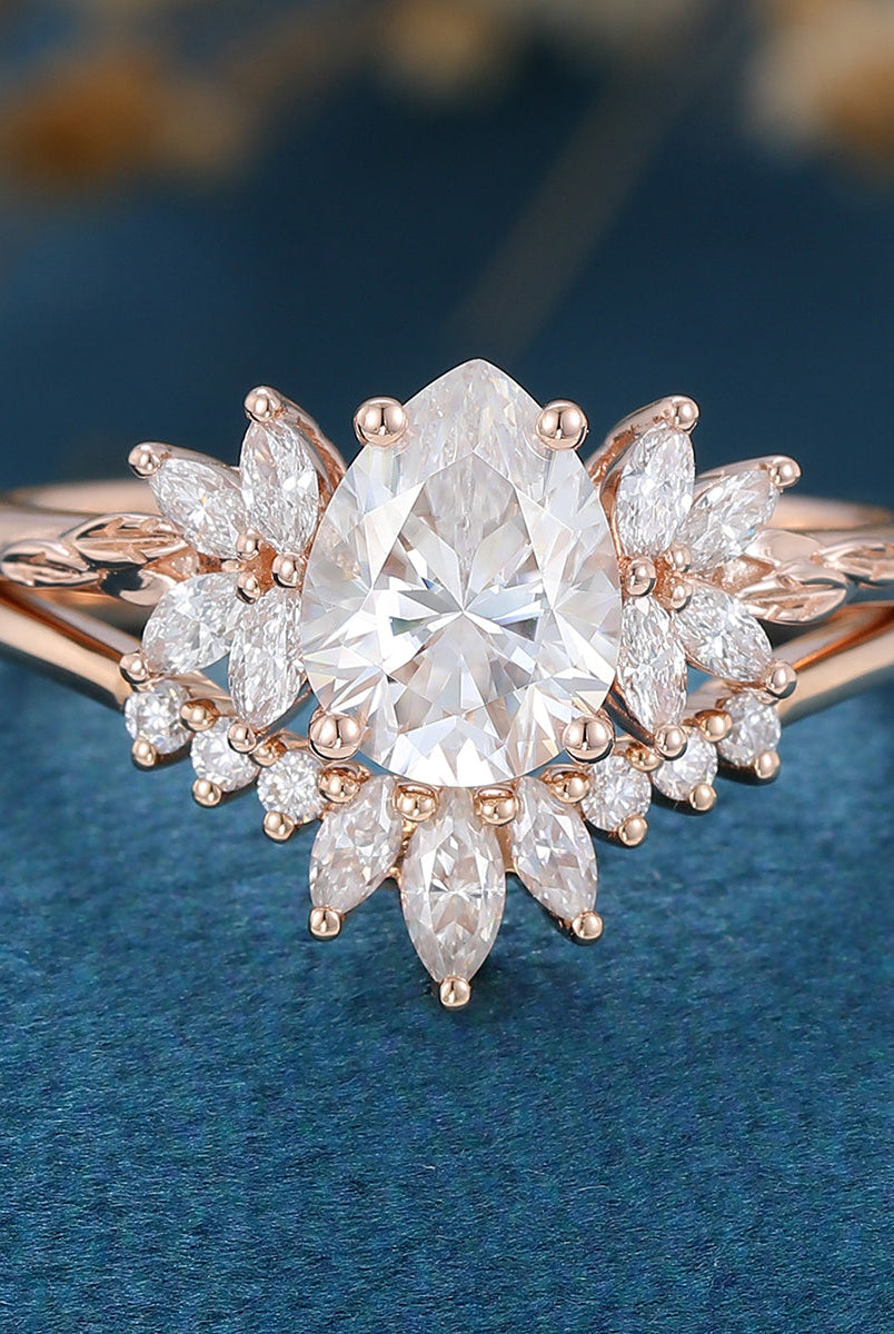 1-0-ct-pear-shaped-moissanite-cluster-bridal-set