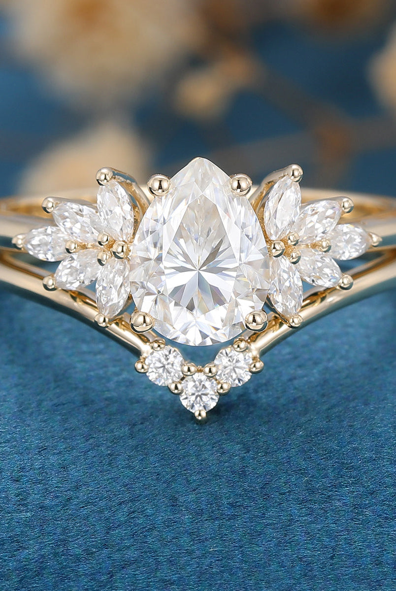 1-0-ct-pear-shaped-moissanite-cluster-bridal-set-4