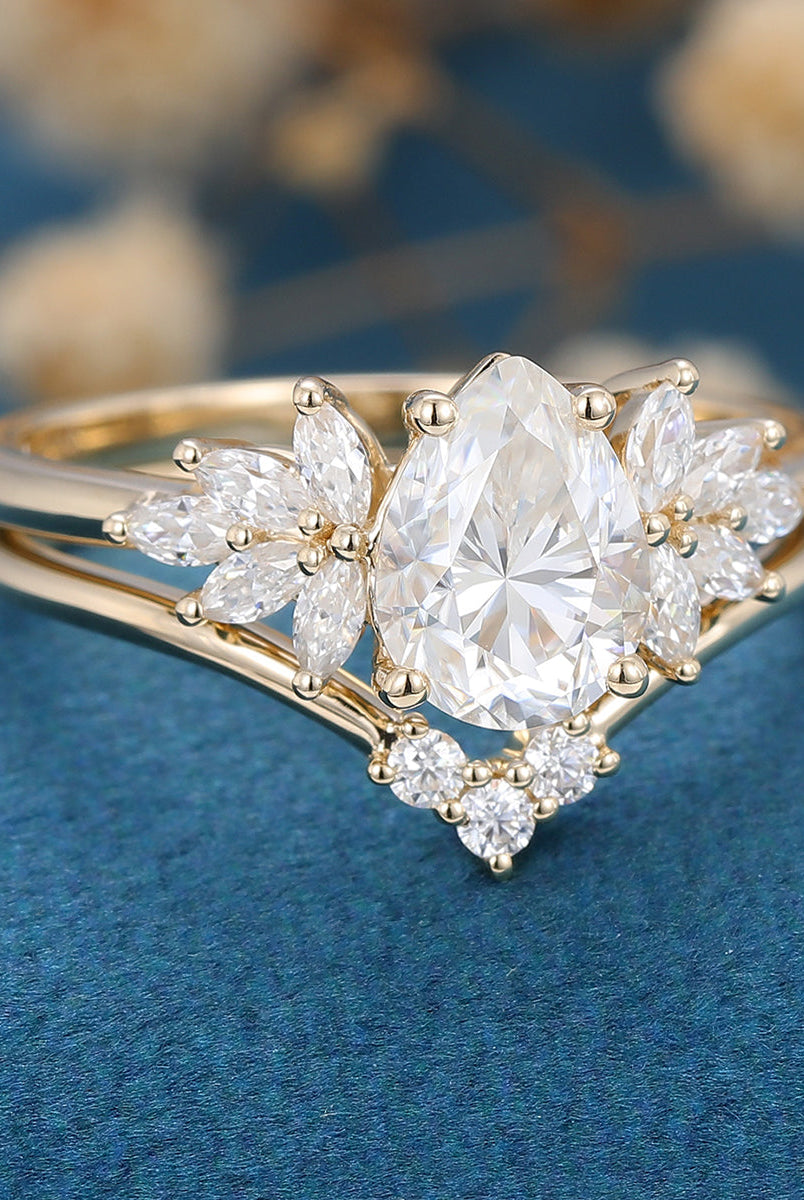 1-0-ct-pear-shaped-moissanite-cluster-bridal-set-4