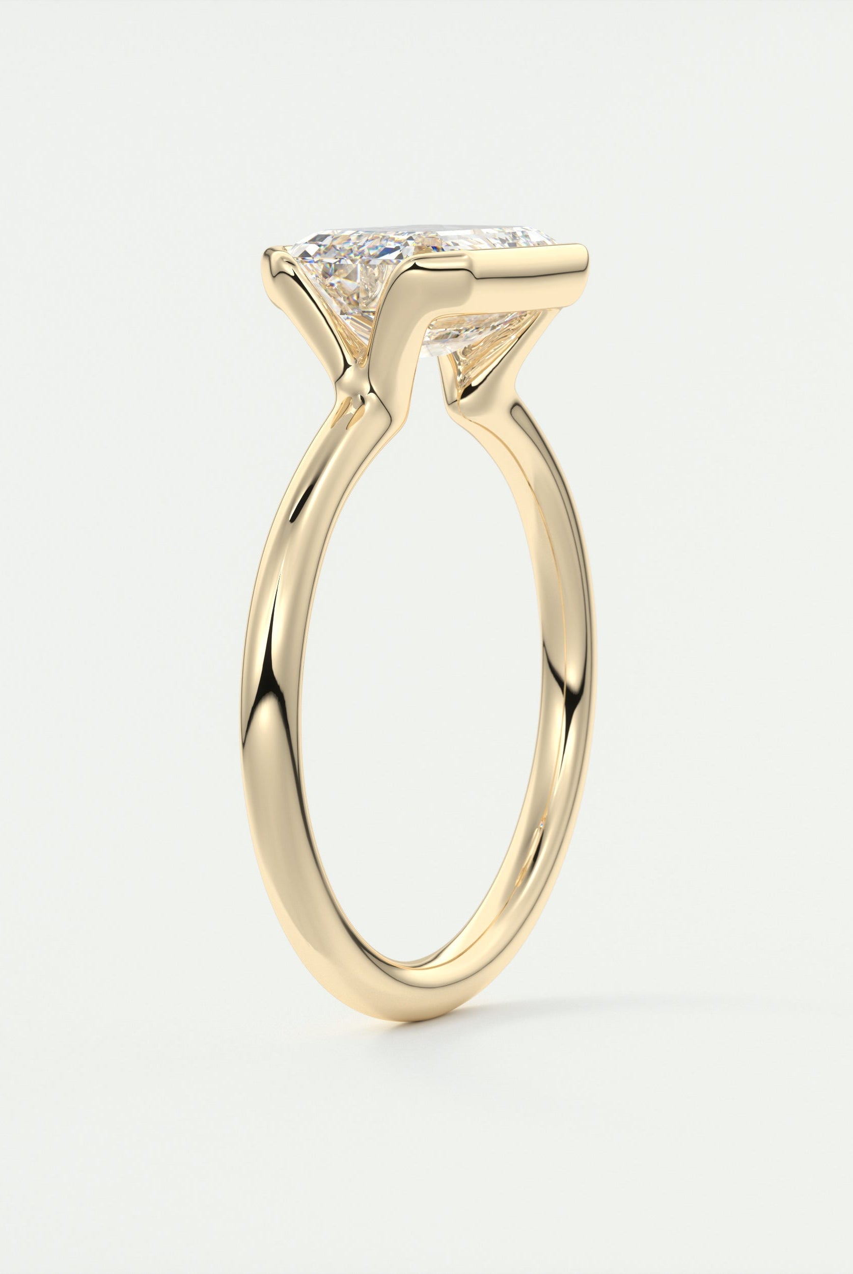 Solitaire Emerald Cut Ring