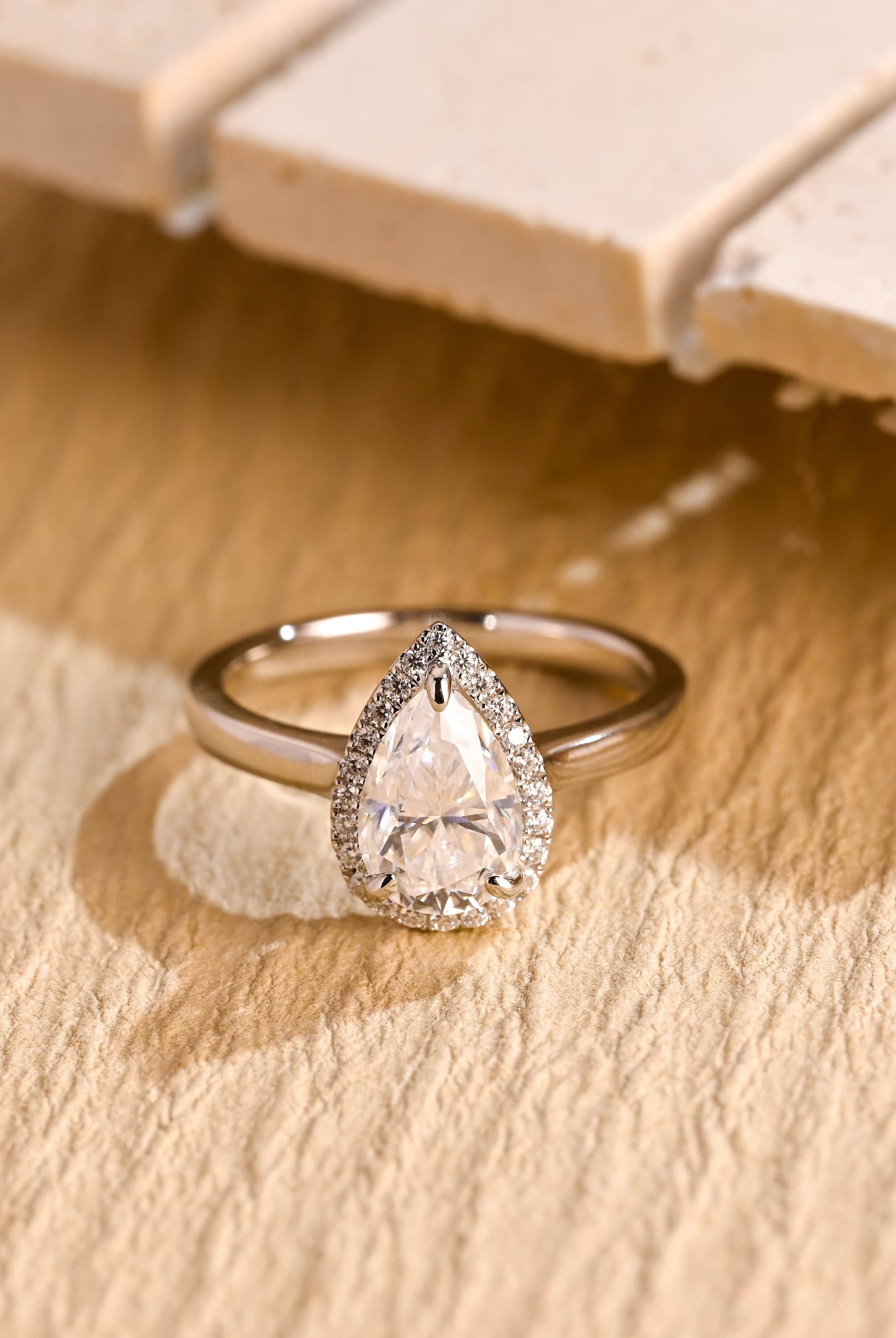 US bridal pear halo moissanite ring