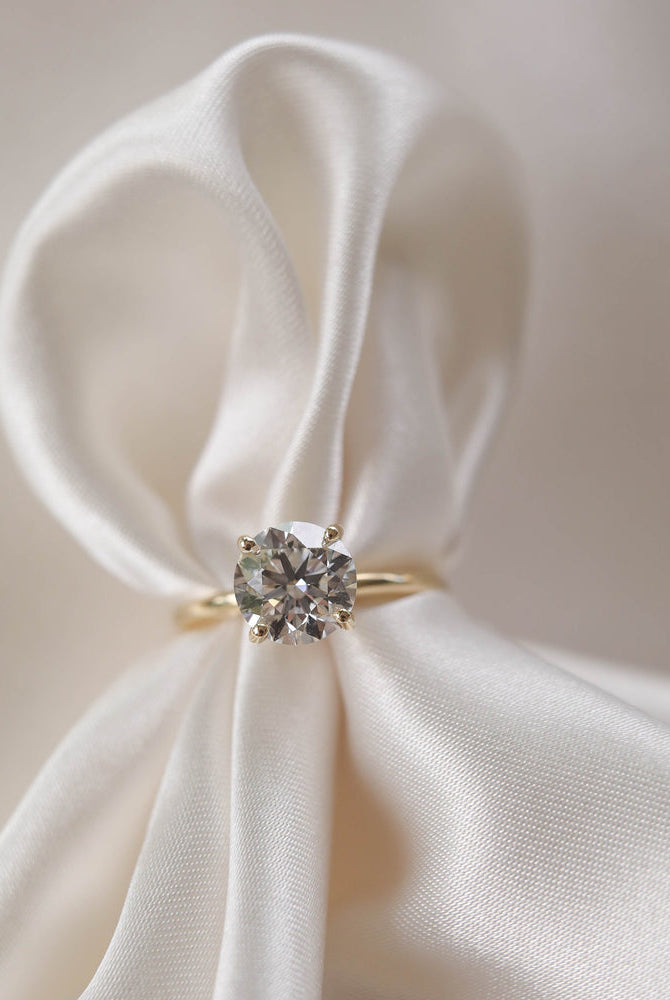 Round Moissanite Engagement Ring
