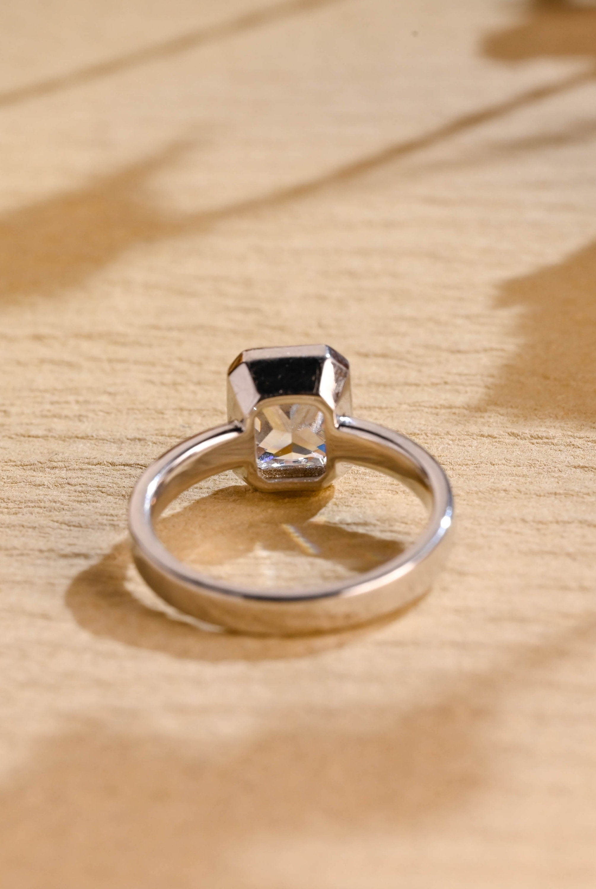 bezel set moissanite engagement ring radiant cut