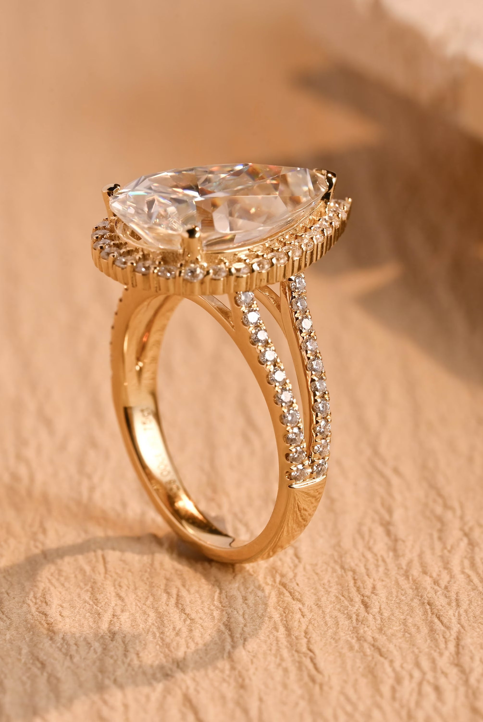 affordable luxury pear halo engagement ring