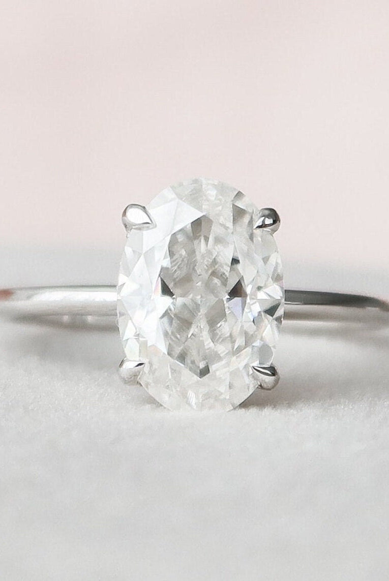 Hidden Halo Oval Ring
