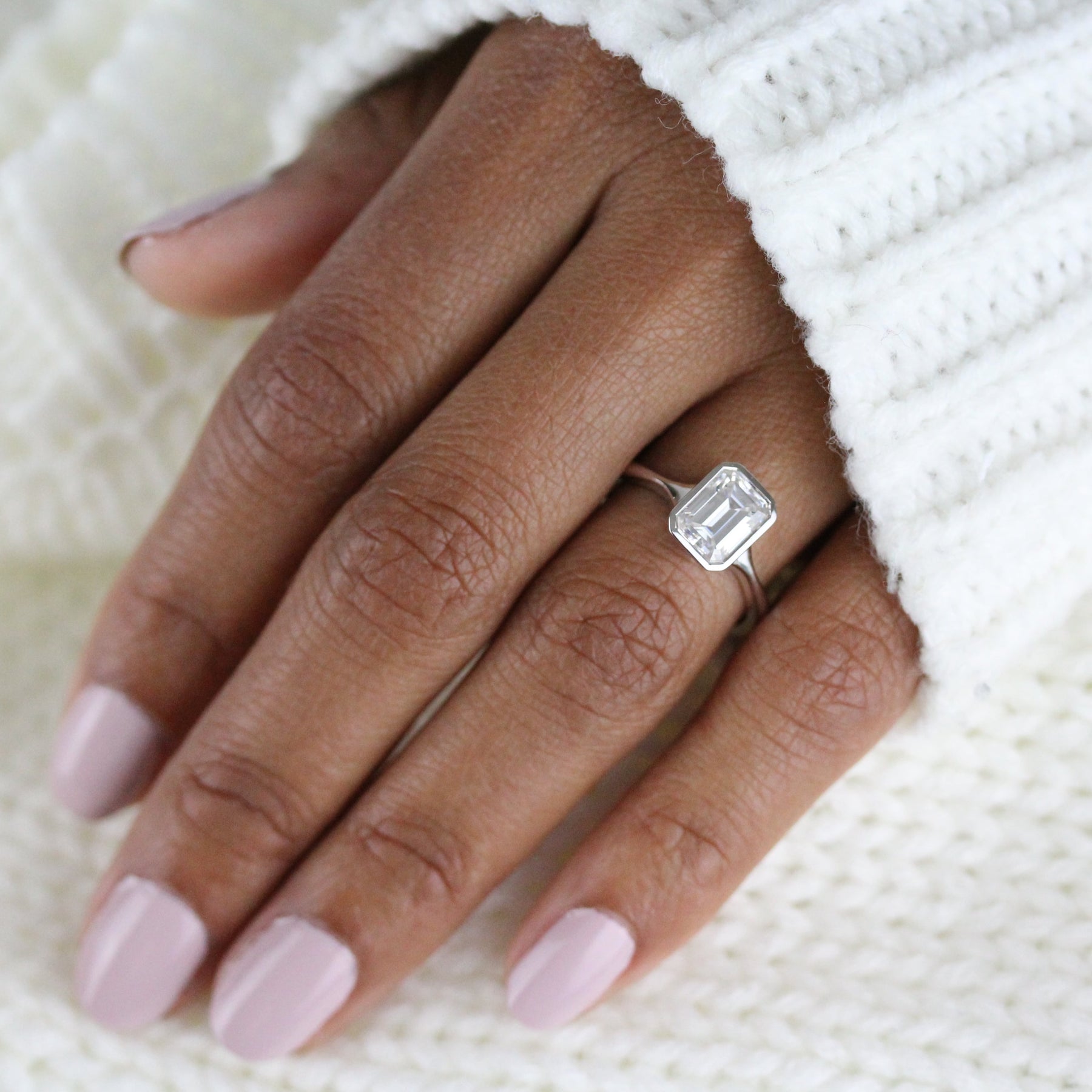Moissanite engagement ring with accents