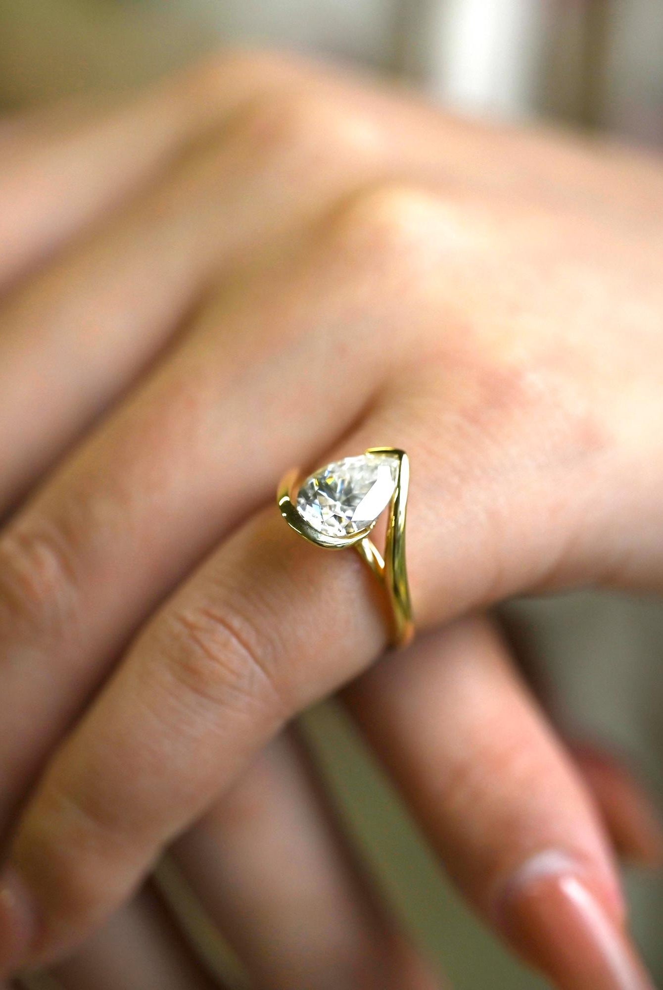 White Gold Pear Moissanite Ring