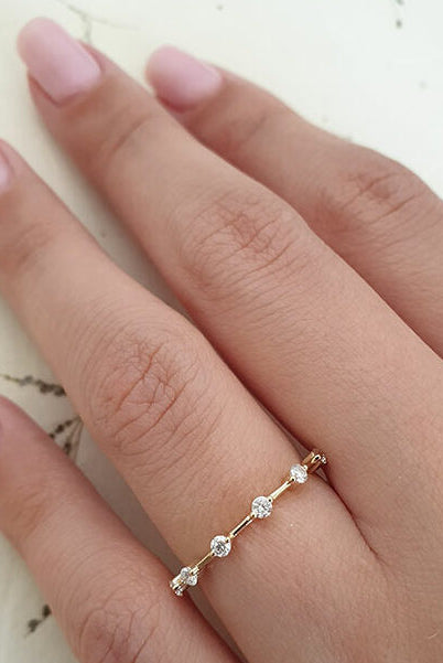 round-cut-dainty-pave-setting-moissanite-wedding-band