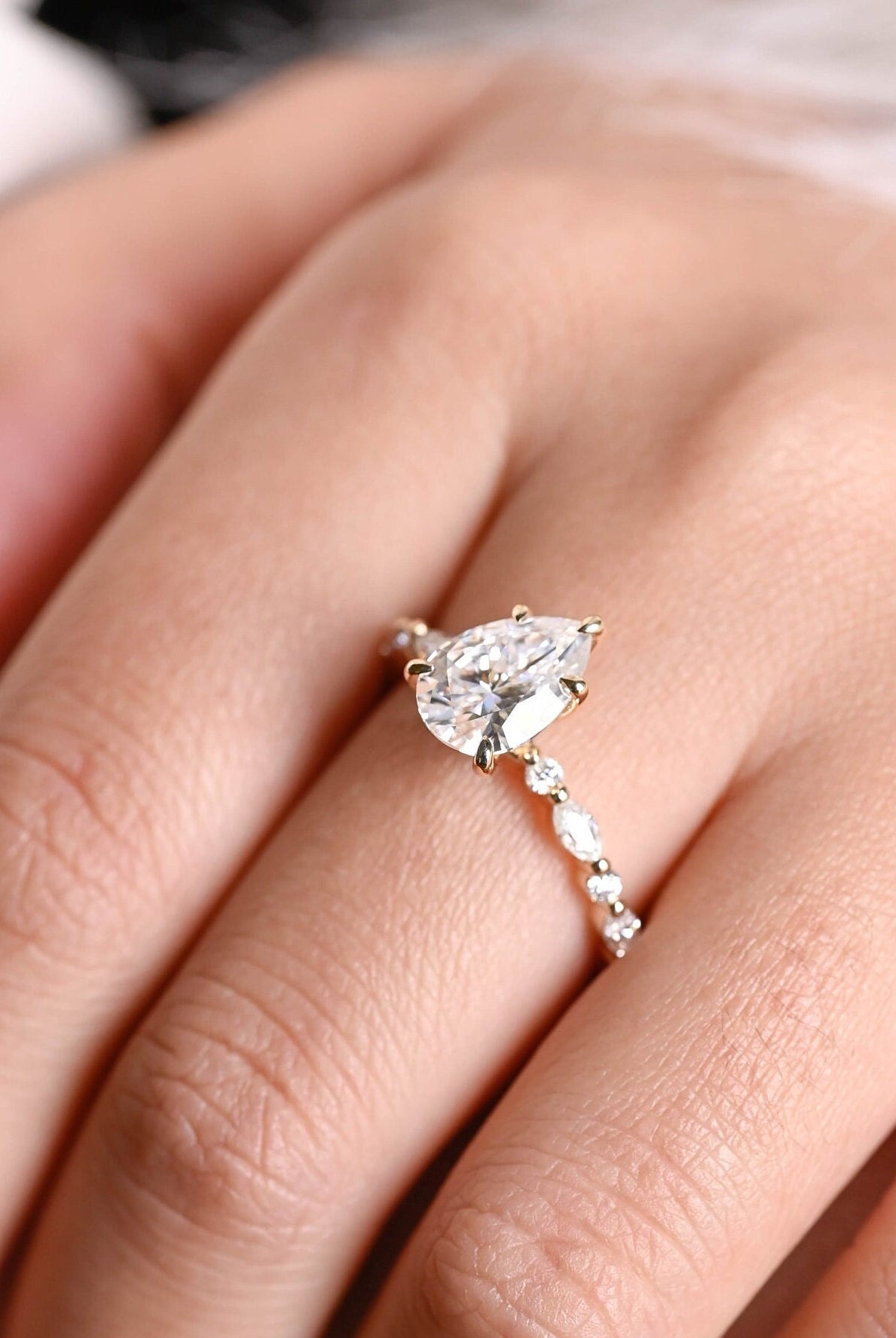 halo style pavé pear engagement ring alternative