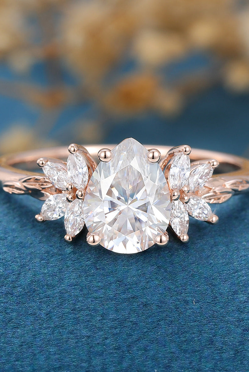 1-0-ct-pear-shape-moissanite-cluster-engagement-ring