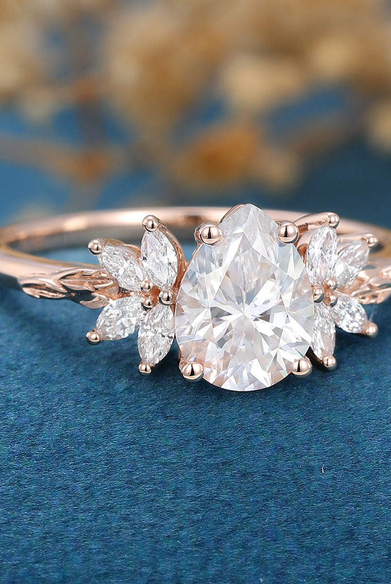1-0-ct-pear-shape-moissanite-cluster-engagement-ring