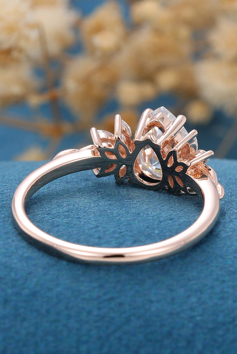 1-0-ct-pear-shape-moissanite-cluster-engagement-ring