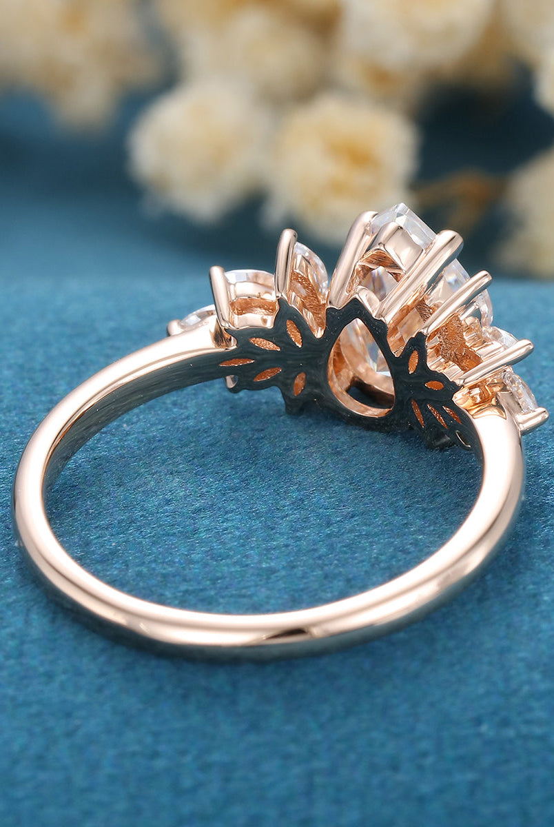 1-0-ct-pear-shaped-moissanite-cluster-engagement-ring-16